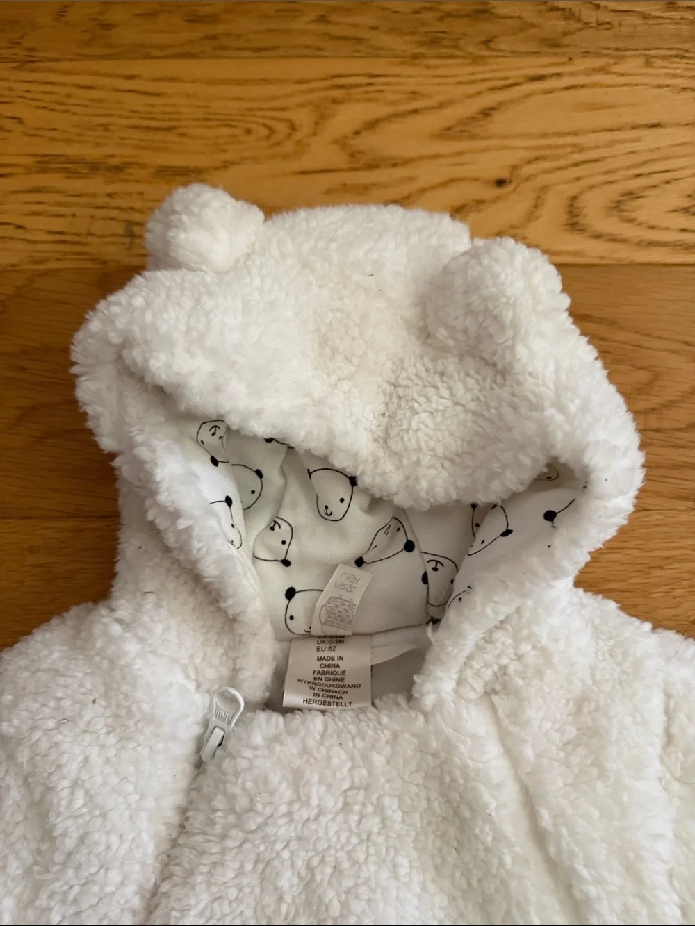 NWOT - 0/3M - Cozy White Sherpa Baby One-Piece with Bear Pocket Hood